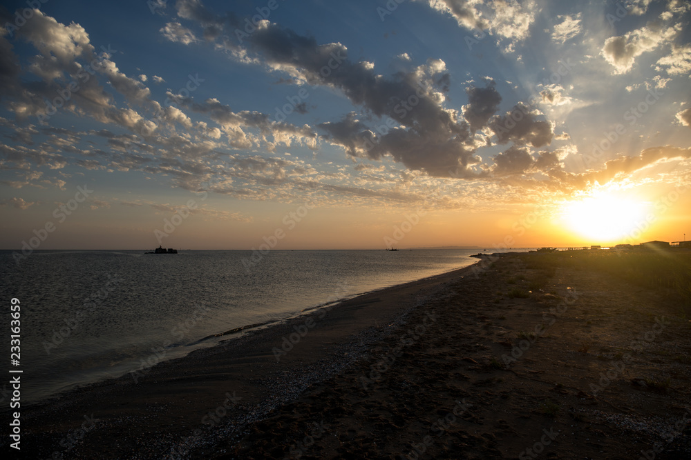 Amazing view of clear sea landscape with cloudy sky as a background Sunset time.