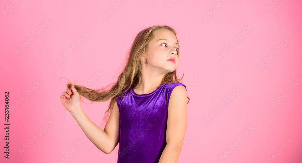 How to make tidy hairstyle for kid. Ballroom latin dance hairstyles. Kid girl with long hair wear dress on pink background. Things you need know about ballroom dance hairstyle. Hairstyle for dancer