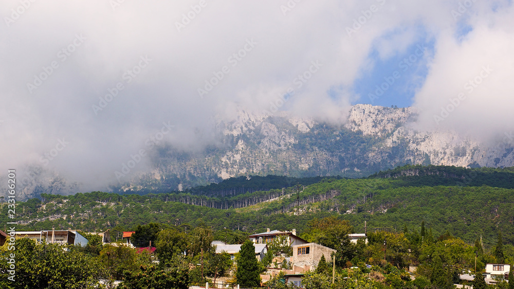 Landscapes Crimea. Clouds descended on the mountains. Alupka, Ay-Petri platea.