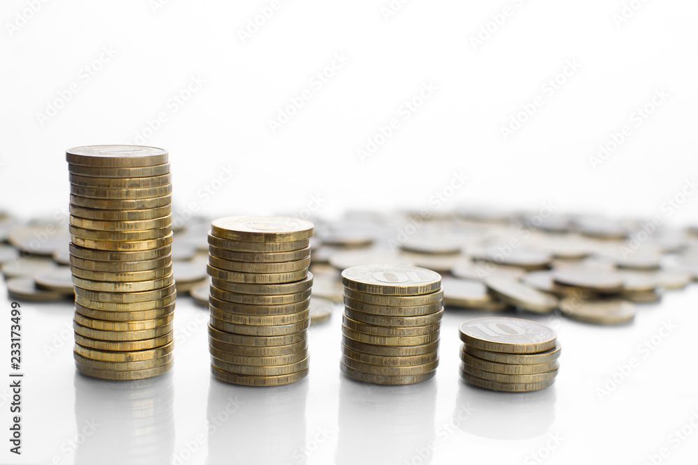 on a white background with a reflection of a lot of scattered coins and a column on a white background with a reflection of a lot of scattered coins and a column