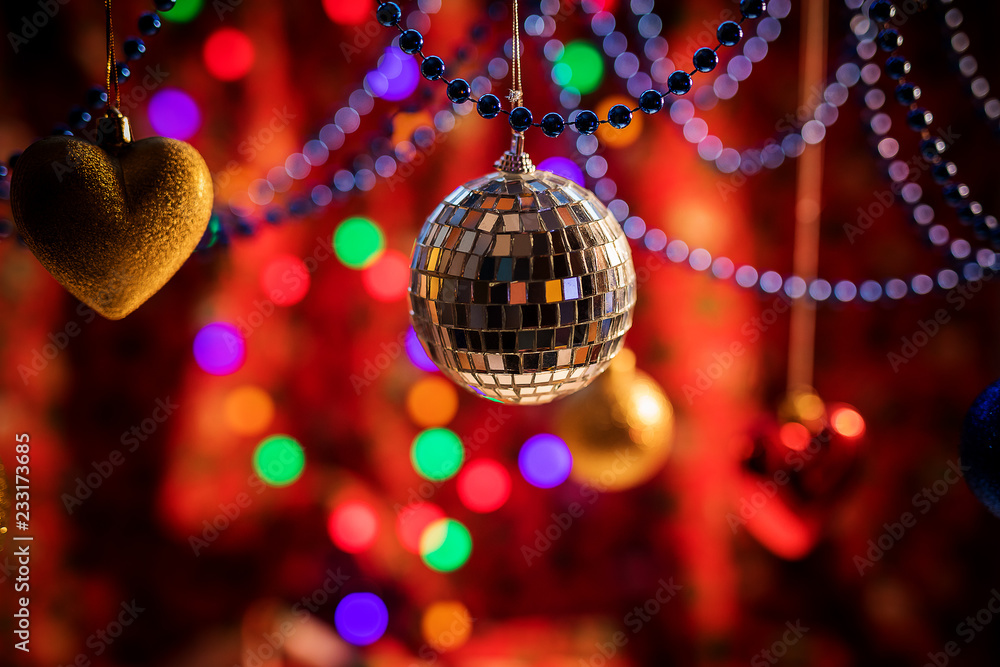 Obraz premium Toys for the new year. Christmas toy. Christmas toy. Toys on the Christmas tree. Christmas lights and candles.