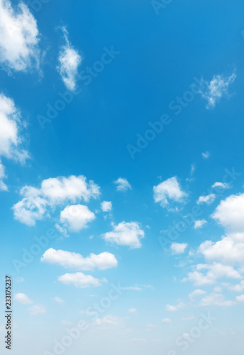 blue sky with puffy clouds