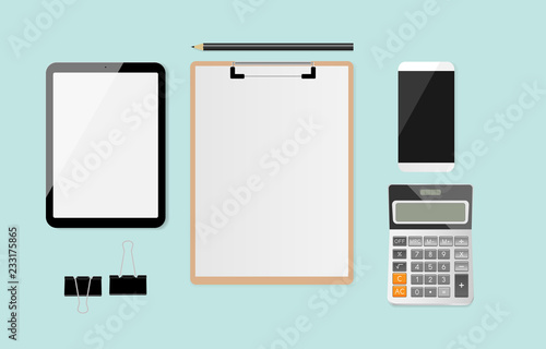 Workplace with blank white paper on clipboard with calculator  pencil  black metallic paper clips  smartphone and tablet on mint green background. Vector illustration