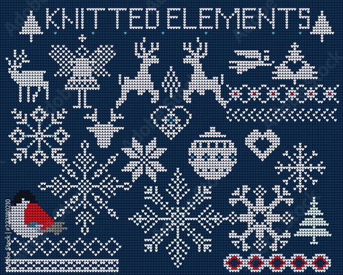  Set of knitted elements, ornaments, snowflakes and other Christmas decoration on blue background