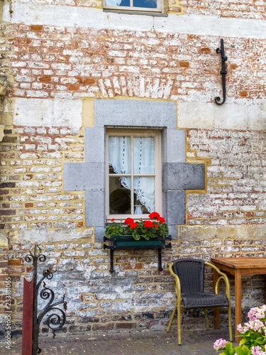 Architectural exterior detail from a building in the bailey of Schaloen Castle in Oud-Valkenburg, the Netherlands photo