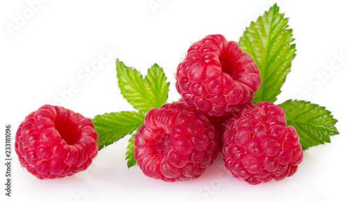 Fresh raspberry with leaf on white background