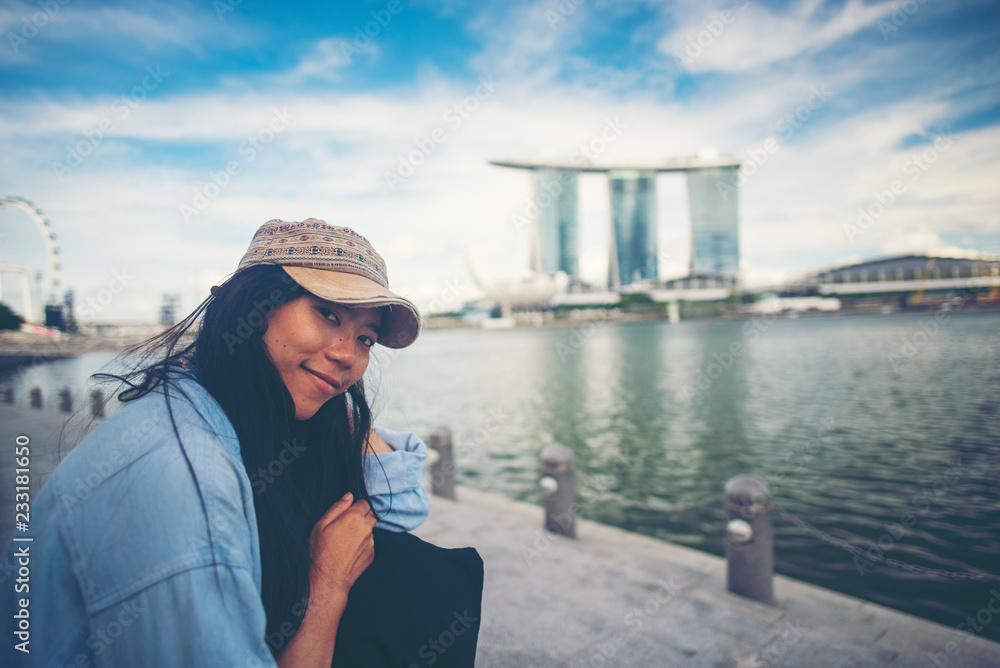 Asian women travel in Singapore