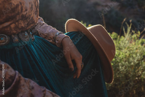 Native American Woman in Traditional Dress surrounded by Sandstone in Glen Canyon National Recreation Area