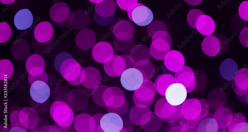Beautiful Purple Lilac Bokeh light on black Background