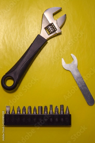 set of tools isolated on yellow background