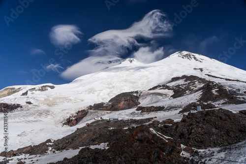 View of Mount Elbrus. The highest point in Europe, sleeping volcano in the Caucasus Mountains. Ski resort, freeride