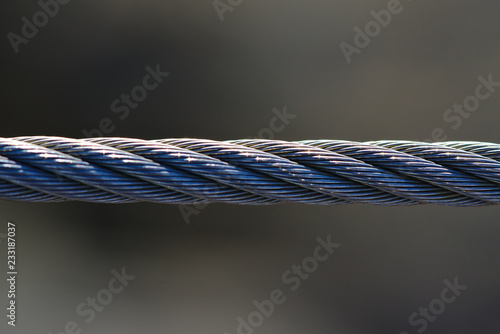 Iron rope with sun reflection