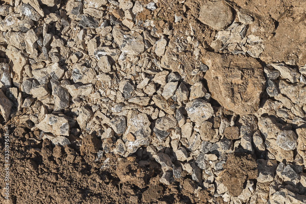 Mixed stone and ground background textured surface. Mixed stone and ground background textured surface.