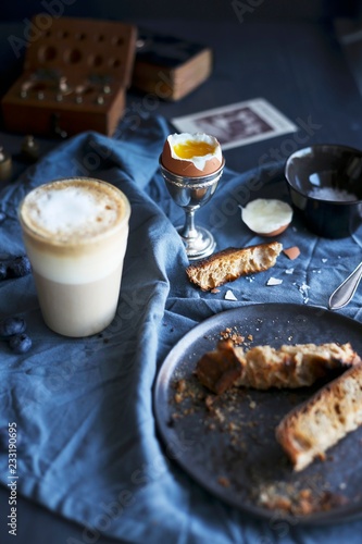 Soft boiled egg and latte photo