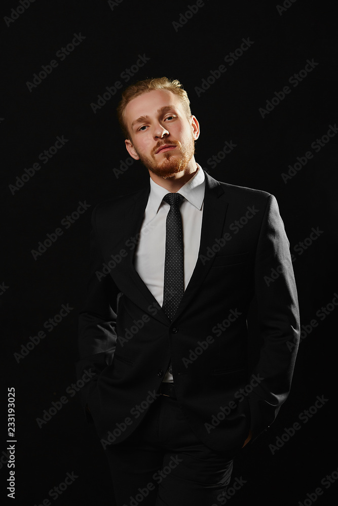 Premium Photo  Stylish bearded man in suit and scarf playing in dark casino