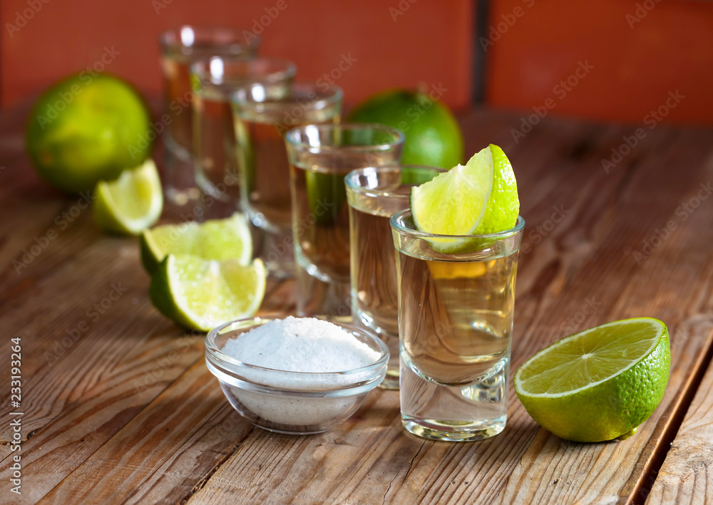 Fototapeta premium Tequila and lime slices.