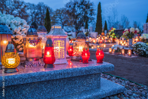 Candles Burning At a Cemetery During All Saints Day. 