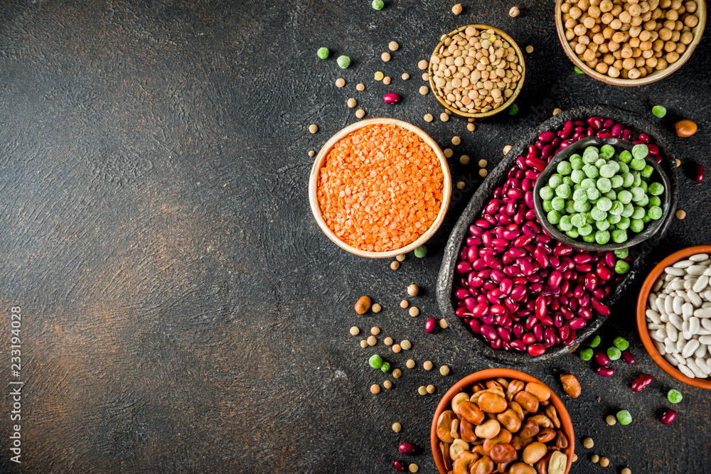 Various assortment of legumes - beans, soy beans, chickpeas, lentils, green peas. Healthy eating concept. Vegetable proteins. White marble background copy space top view Various assortment of legumes - beans, soy beans, chickpeas, lentils, green peas. Healthy eating concept. Vegetable proteins. White marble background copy space top view