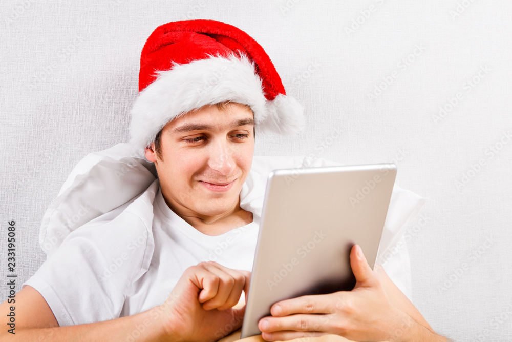 Young Man in Santa Hat Young Man in Santa Hat