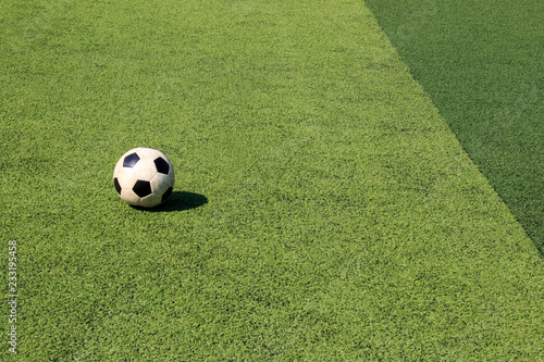 Football on artificial turf. It is for green background in a stadium © Fotoglee