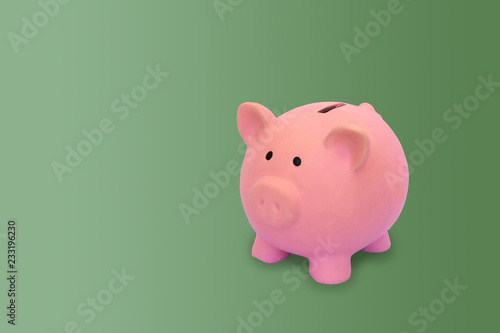 Piggy bank with green background