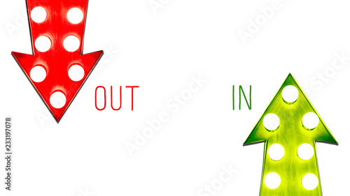 In or Out red and green left right up down vintage retro arrows illuminated light bulbs. Concept for advantages and disadvantages, risk and opportunity.  Isolated on white background with text