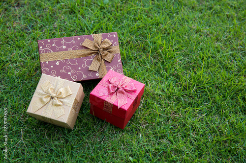 gift box with white ribbon isolated on natural background. Valentine gift box with ribbon and bow.Christmas gift box - Vintage effect style pictures.New Year Gift box.