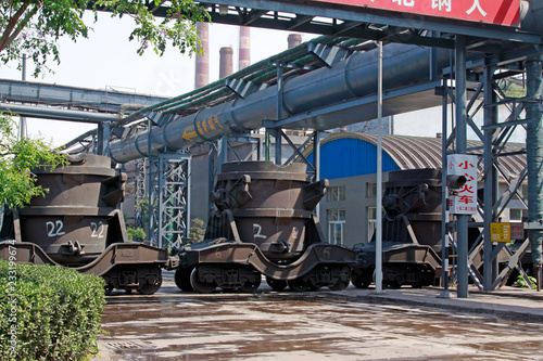 hot metal transport vehicles in a factory