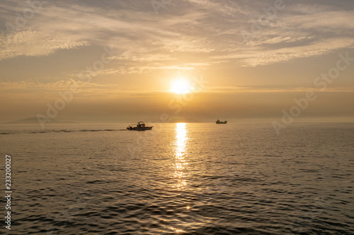 sunset on the sea © mehmetsisoglu