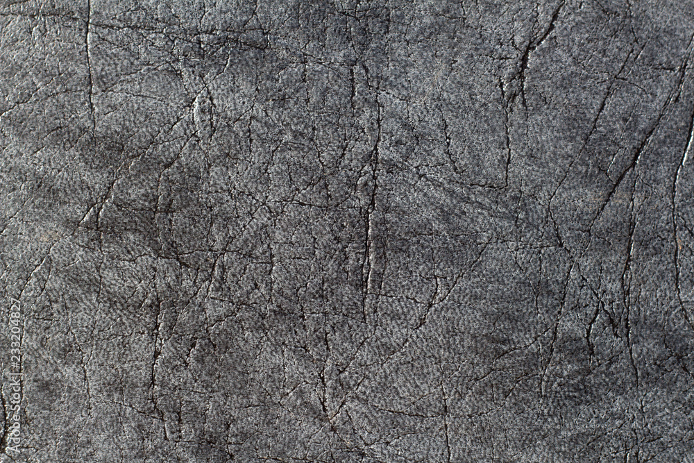 Textured faux leather synthetic background closeup macro Textured faux leather synthetic background closeup macro