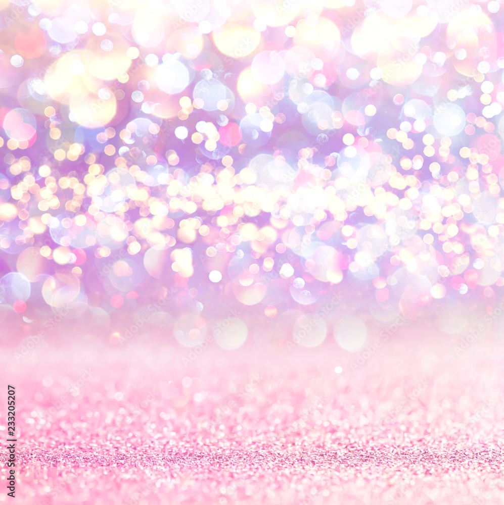 Pink glitter lights background. defocused