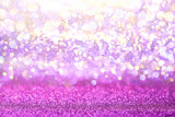 Purple glitter lights texture bokeh abstract background. defocused