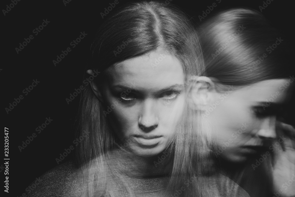 Back and white multiple exposure of beautiful young woman with mood disorder Back and white multiple exposure of beautiful young woman with mood disorder