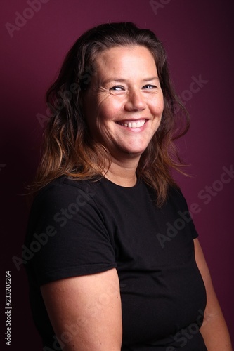 Woman in front of a colored background