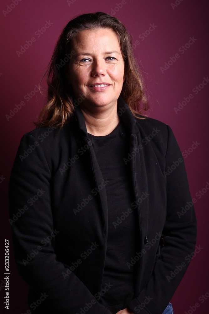 Woman in front of a colored background Woman in front of a colored background