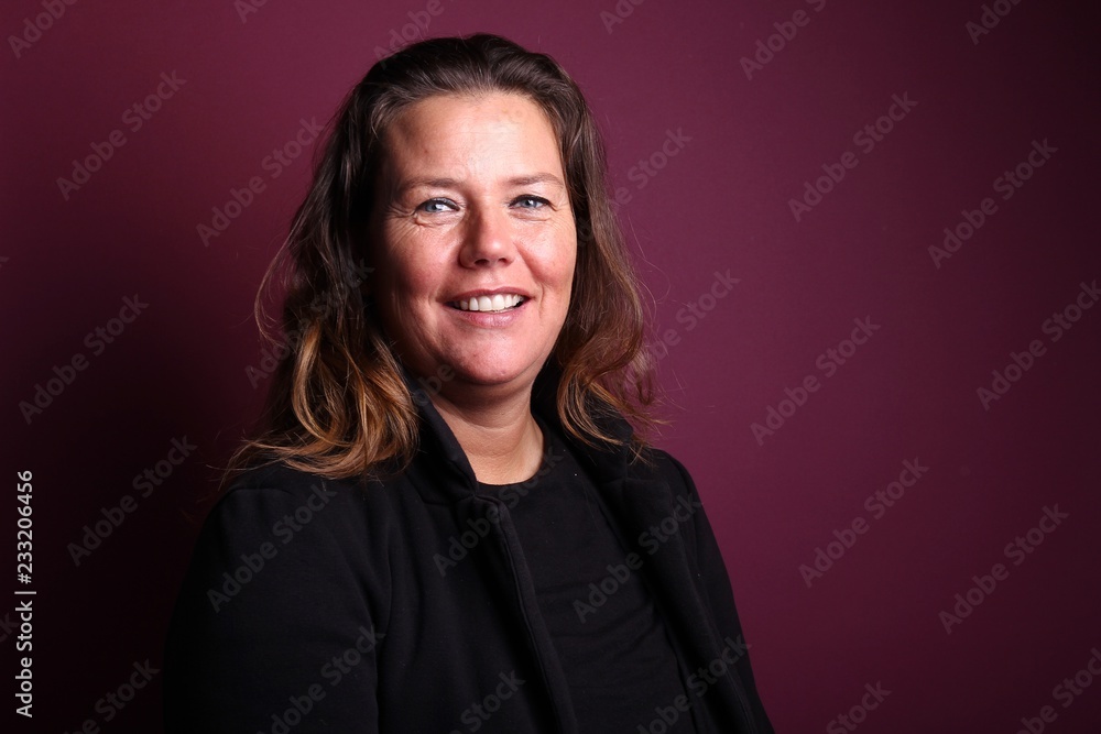 Woman in front of a colored background Woman in front of a colored background