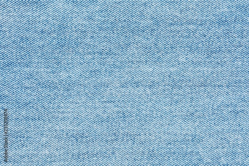 old pale blue denim jean texture photo
