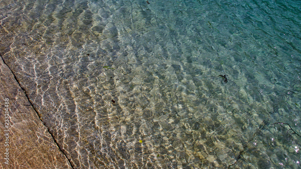 Fototapeta premium shallow water over sand