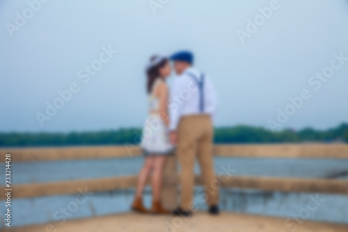 pre wedding sceen out door tree background.,asian lover ,Blur of pre wedding photo, soft beautiful. pre wedding couple happy man and woman