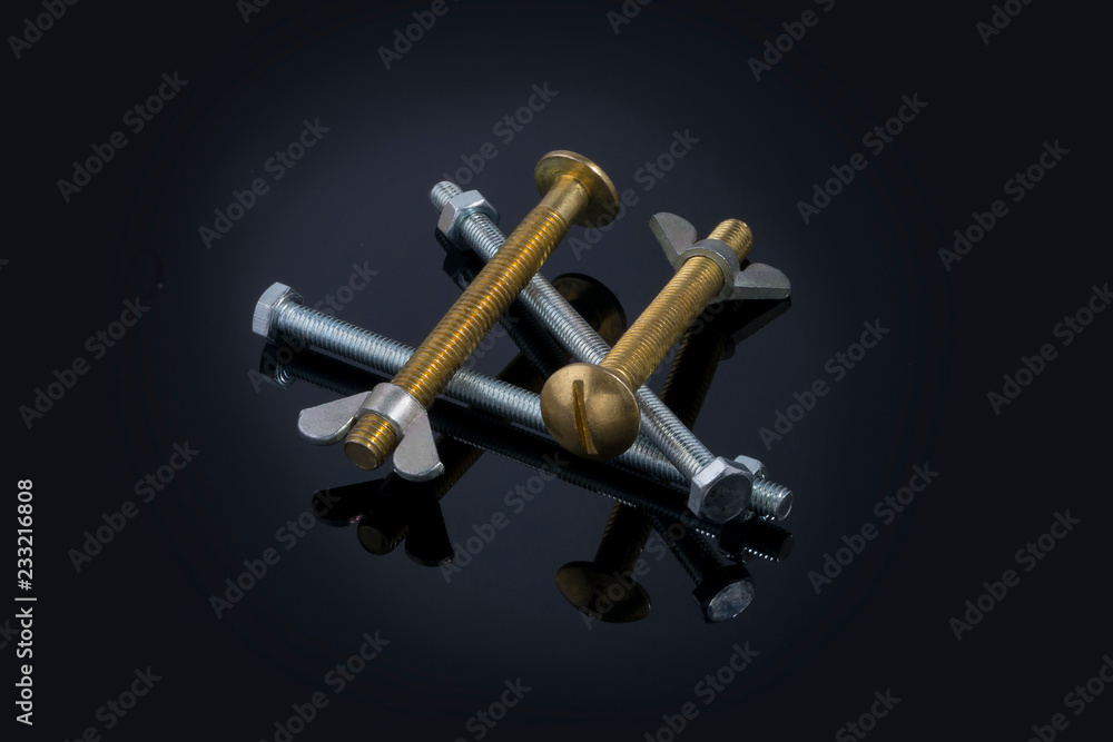 Bolts And Nut On Black background with reflection Bolts And Nut On Black background with reflection