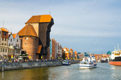 Zuraw Crane and colorful buildings on Motlawa river, Gdansk, Poland