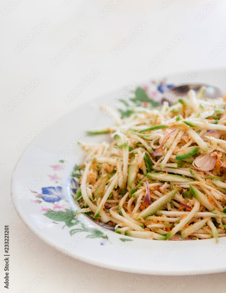 Yum Mamuang Bao - Green mango salad, local southern Thai food Yum Mamuang Bao - Green mango salad, local southern Thai food
