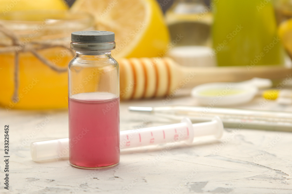 Various medicines for flu and cold remedies on a white wooden table .. Cold. diseases. cold. flu. Various medicines for flu and cold remedies on a white wooden table .. Cold. diseases. cold. flu.