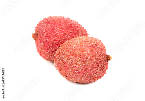 Two lychee fruit