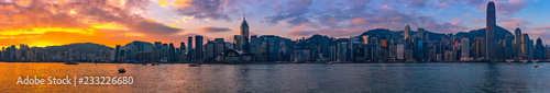 Panorama sunrise of Victoria Harbour in Hong Kong.