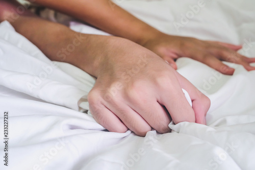 Hands of couple lover sex on the bed Concept about love  sex and lifestyle.