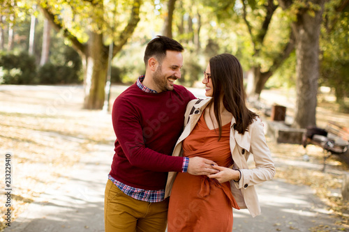 Young woman and man walking...