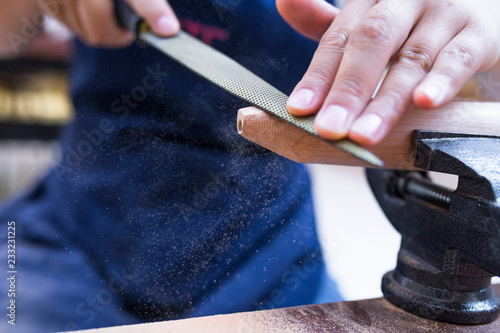 Close up of carpenter working photo