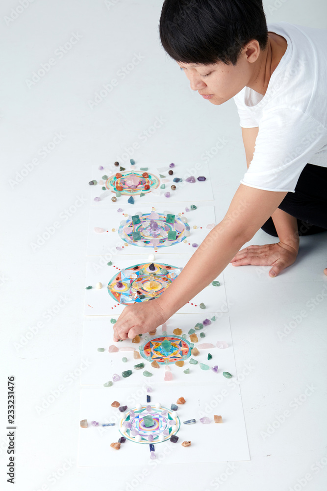Mandala pattern with crystal and Asian women. a creator Mandala pattern with crystal and Asian women. a creator