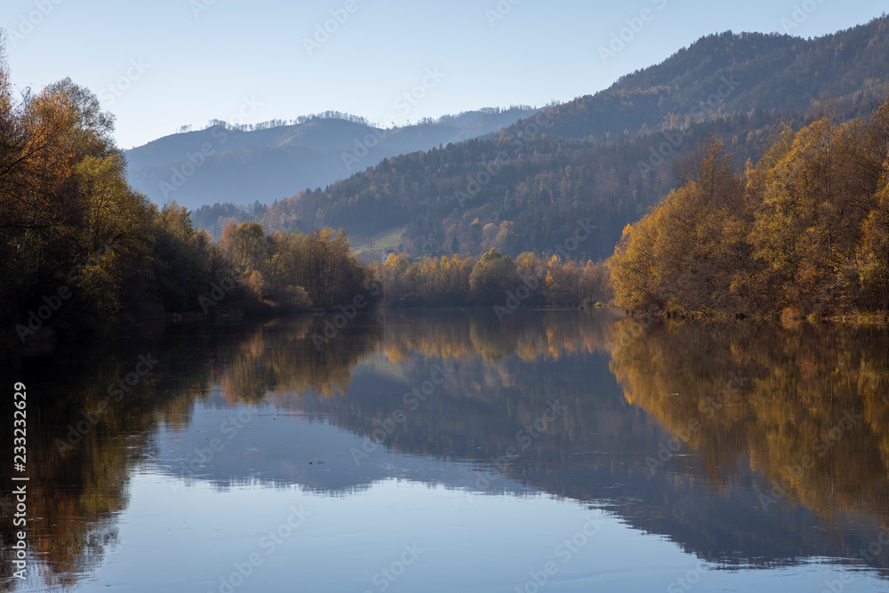 autumn on mur river near village deutschfeistritz in styria, austria